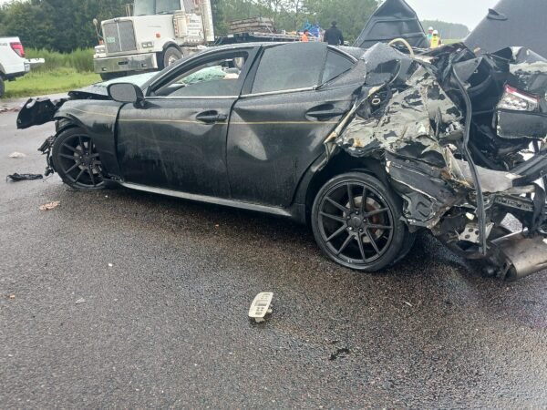 Lexus Collides with Disabled Tractor-Trailer on I-4, Two Seriously Injured